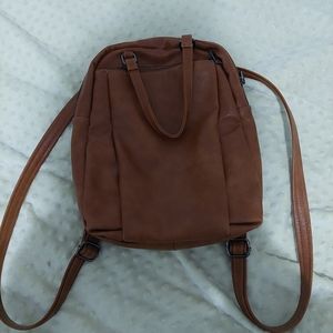 Brown crossbody to backpack purse